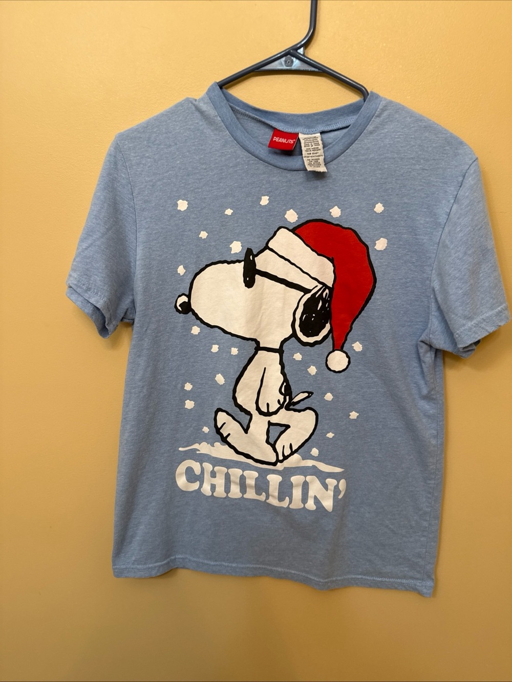Peanuts Light Blue Short Sleeve Tee with Red Santa Hat Snoopy Graphic